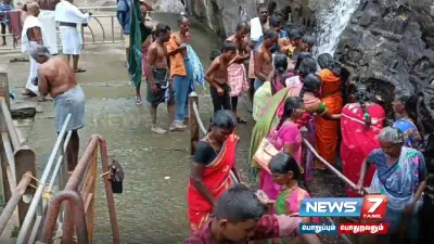 சுட்டெரிக்கும் வெயில்   குற்றாலத்தில் குவிந்த பொதுமக்கள் 